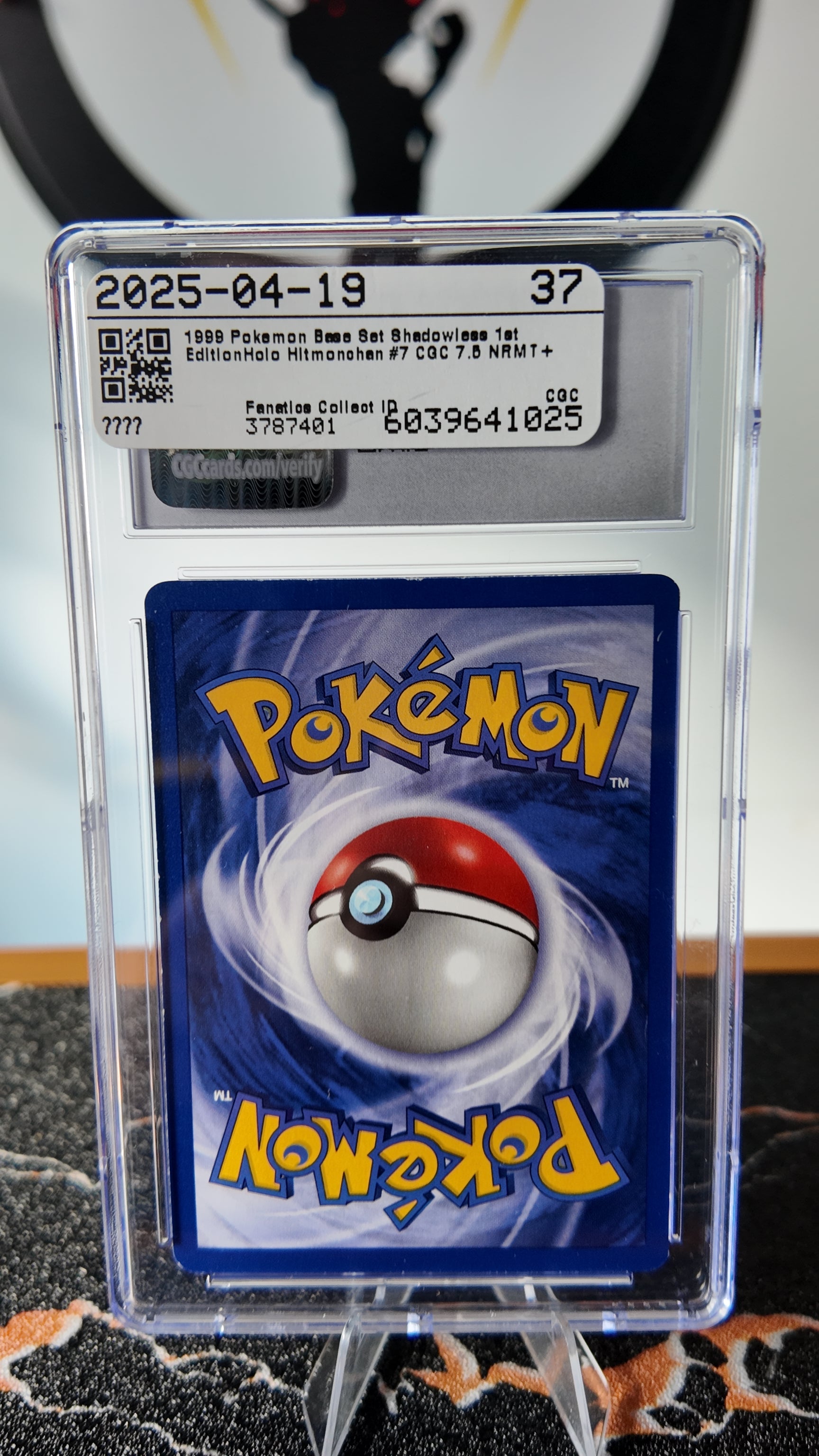 Hitmonchan base set , 1a edición , shadowless , CGC 7,5