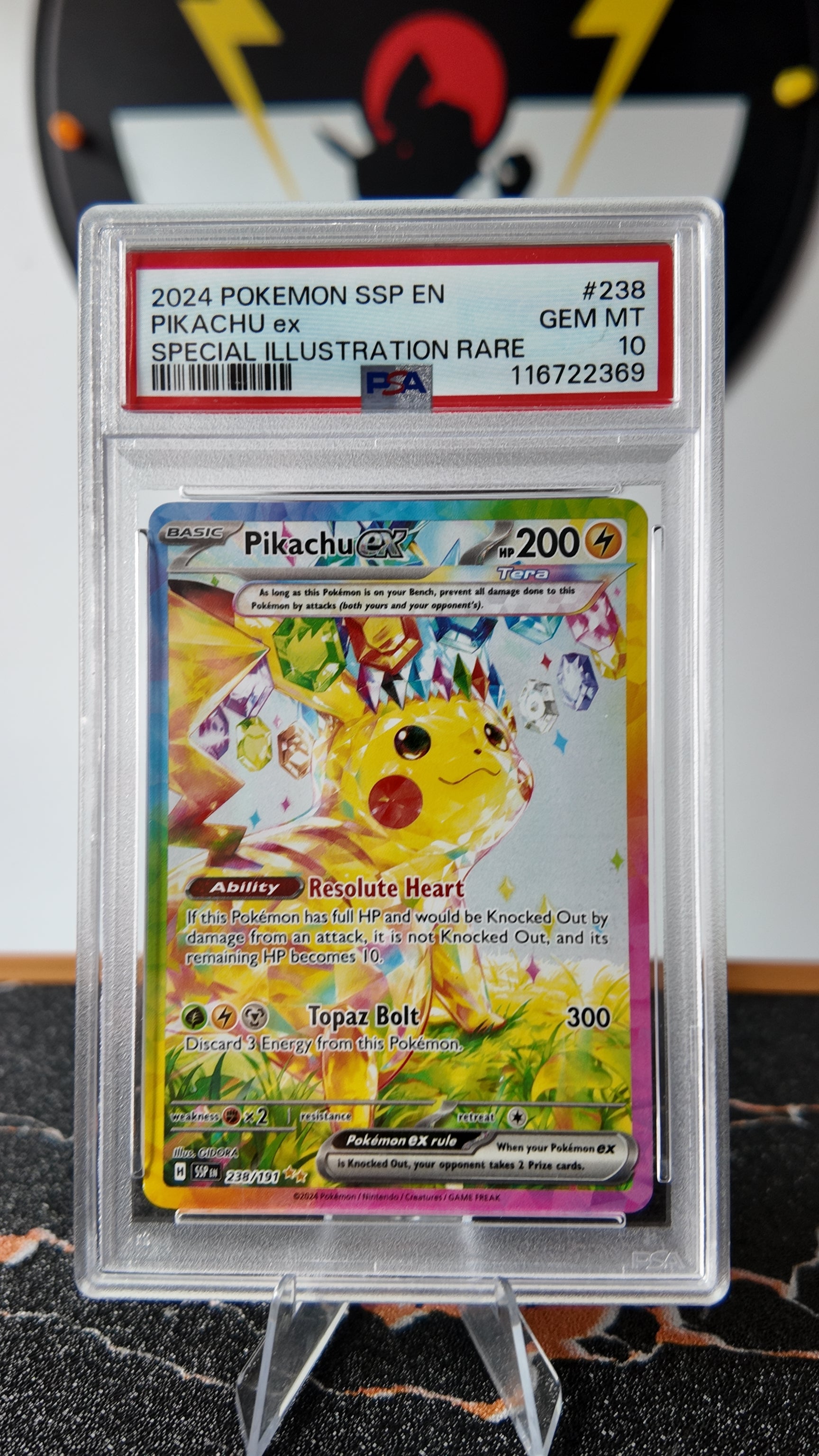 Pikachu Surging Sparks , PSA 10 , Ingles