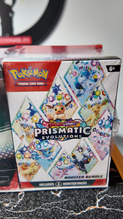 Caja combo exclusiva de venta en USA ,Surprise Box + Bundle Prismatic Evolutions( 10 sobres en total) , Ingles